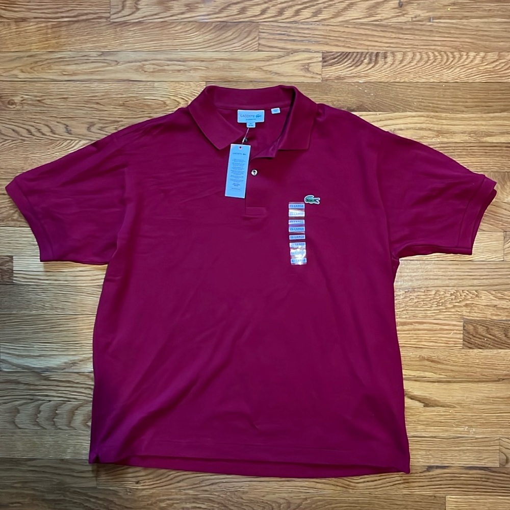 Brand new never been worn and tags still on it Lacoste polo shirt.